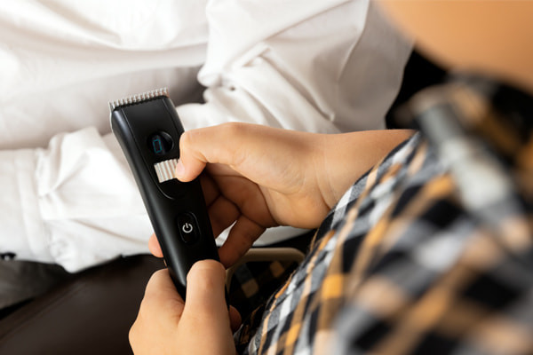 Met mechanische tondeuse